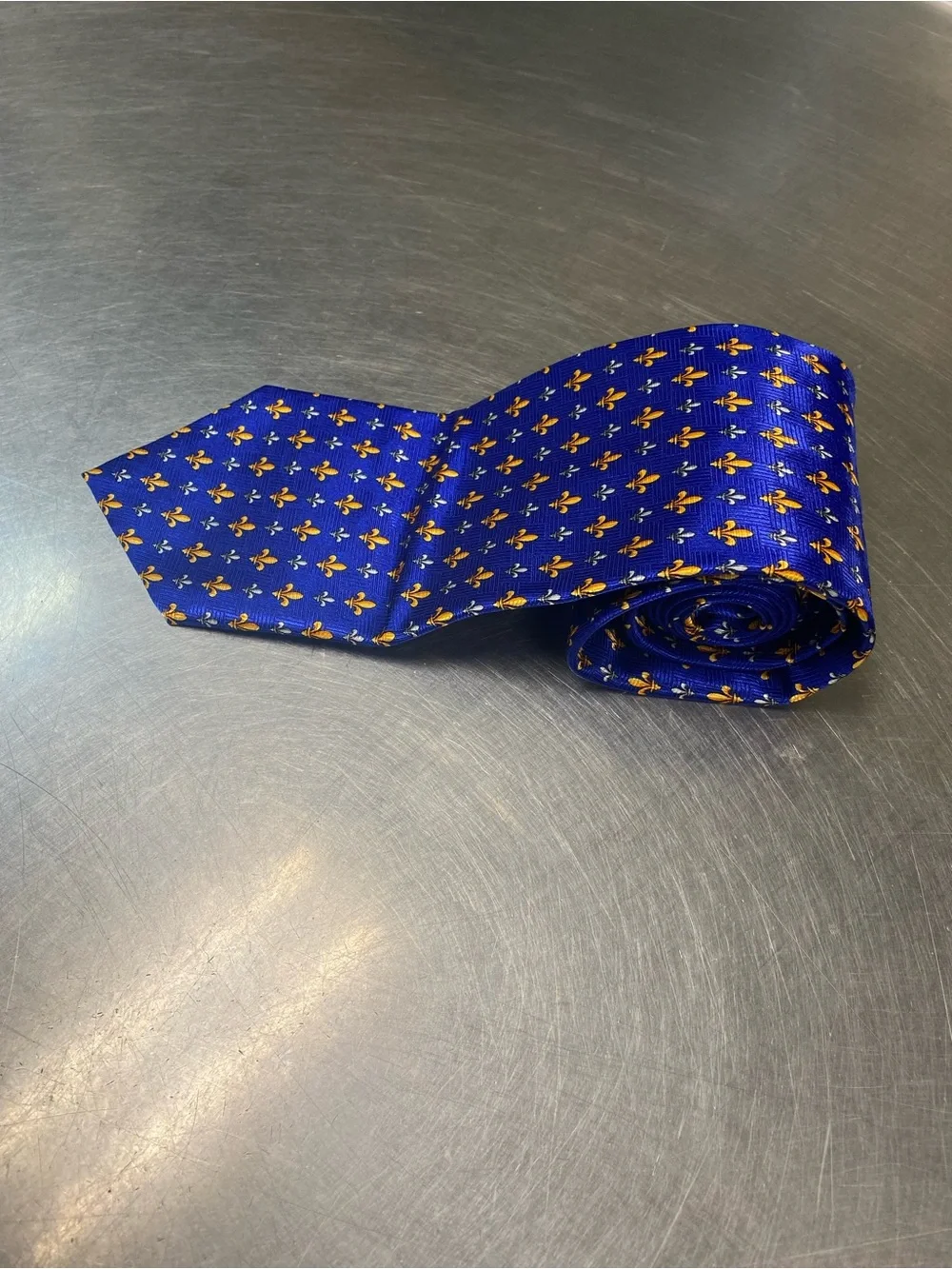 Men's Blue Tie with Gold Fleur-de-Lis Pattern